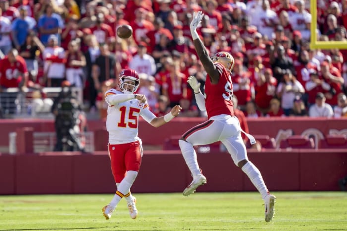 October 23, 2022; Santa Clara, California, USA; Kansas City Chiefs quarterback Patrick Mahomes (15) passes the football against San Francisco 49ers defensive end Charles Omenihu (94) during the second quarter at Levi's Stadium. Mandatory Credit: Kyle Terada-USA TODAY Sports
